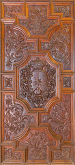 Granada - carved baroque door of Basilica San Juan de Dios.