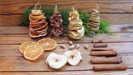 Christmas composition Christmas trees are handmade from dried fruits apple, pear, orange, lemon