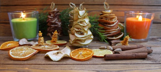 Christmas composition Christmas trees are handmade from dried fruits apple, pear, orange, lemon