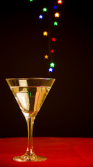 star shape bokeh lights floating out of glass