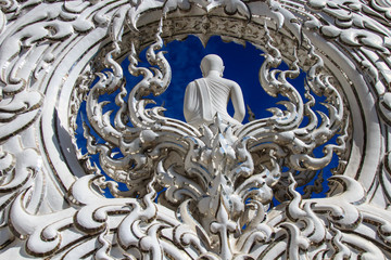 Architectural detail of Wat Rong Khun temple in Chiang Rai, Thailand