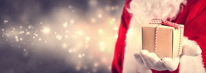 Santa Claus holding gift