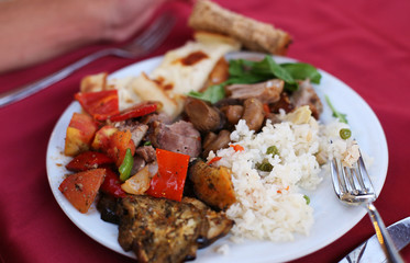 Sweet and sour pork and rice on a plate