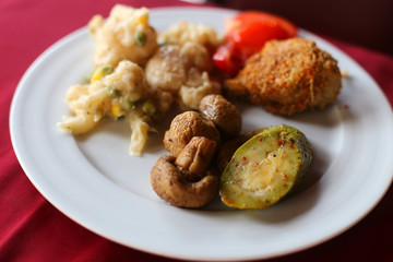 Roasted vegetables with pine nut and parsley 