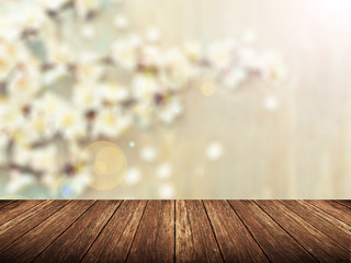 Empty wood table over blurred flower with bokeh background, product display template,deck,
