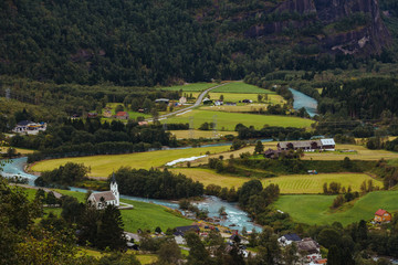 Obraz premium Large view over a typical village located in a valley somewhere in Norway, Europe