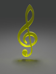 Treble clef from yellow glass