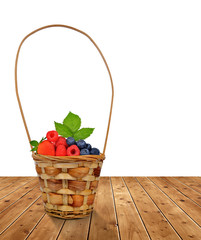 Fototapeta na wymiar Woden basket with fruits on table