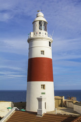 Fototapeta na wymiar Background beautiful bright landscape lighthouse at Cape Europe, on the southern tip of Gibraltar