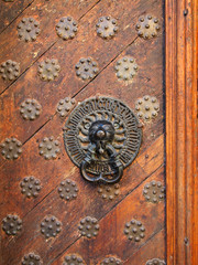Old-fashioned door with doorhandle