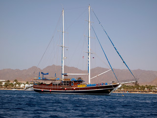 Sailboat against Egyptian shoe