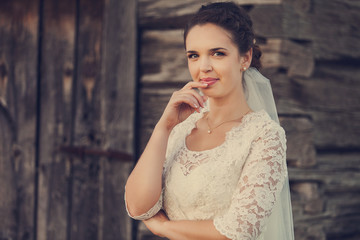 Fototapeta premium beautiful young bride in a wedding dress