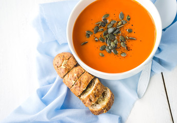 Pumpkin soup on a wooden table