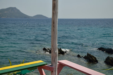 Beach bar wooden construction and sea
