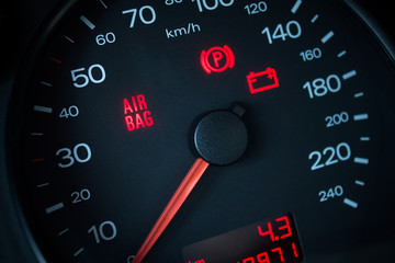 Airbag warning light. Car dashboard in closeup