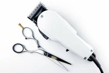 Fototapete Friseur hair cutting scissors and hair clippers for hairdressers.