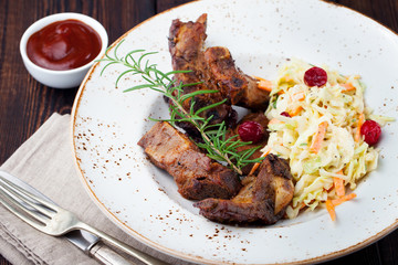 Grilled sliced barbecue pork ribs Salad cole slaw 