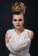 Close-up portrait, girl in vintage, shabby chic, retro style and white dresses on a black background