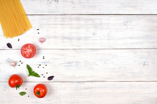 Italian Pasta Ingredients On White Wooden Table, Top View