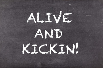 Alive and kickin, business motivational slogan