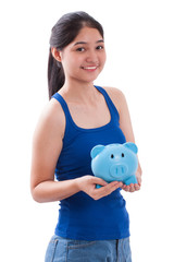 Fototapeta na wymiar Happy young woman with piggy bank on white background