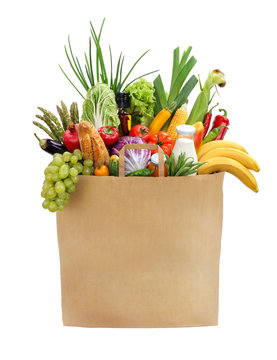 Full grocery bag / studio photography of brown grocery bag with fruits, vegetables, bread, bottled beverages - isolated over white background. High resolution product
