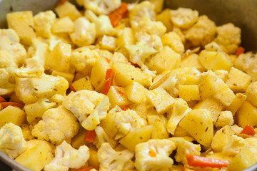 Closeup of roasted potatoes with cauliflower