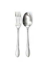 silver spoon and fork vertical alignment isolated in white background