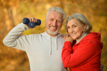 fit senior couple exercising