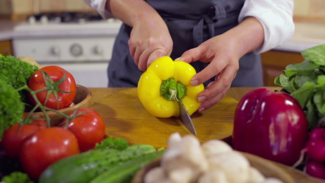 chef carving a fresh pepper slow motion 