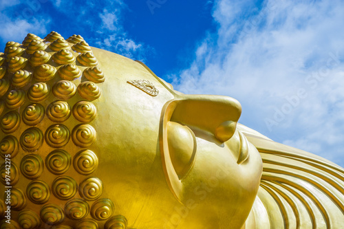 "head of sleeping buddha statue at ko yor temple Songkla province