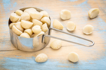 macadamia nuts in metal scoop