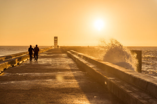 Couple walking on  sunset light