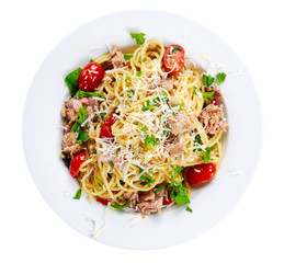 Italian Tuna Pasta spaghetti with tomato, chili, Parmesan cheese and wild rocket lives. isolated on white