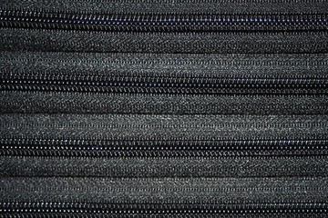 Black zipper background © miljanam