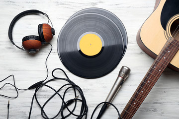 Close up view on musical equipment against grey wooden background