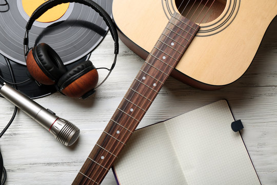 Close up view on musical equipment against grey wooden background