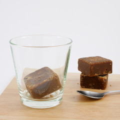 The Taiwan brown sugar ginger tea cubes on the wooden board.
