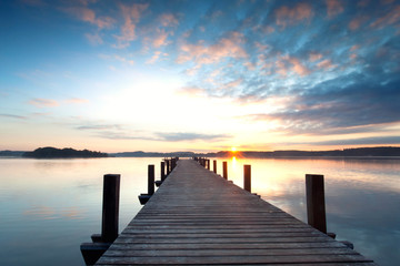Fototapeta na wymiar Sonnenaufgang morgens am See