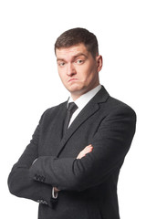 Businessman in suit with crossed arms
