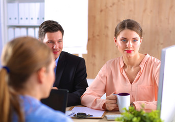 Business meeting -  manager discussing work with his colleagues