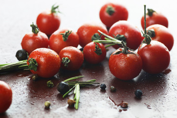 Water drops green and tomatoes