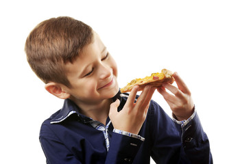 Little boy eating pizza isolated on white