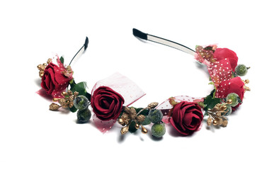 beautiful wreath on the head with decorative flowers