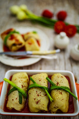 Stuffed cabbage with meat and rice in tomato sauce
