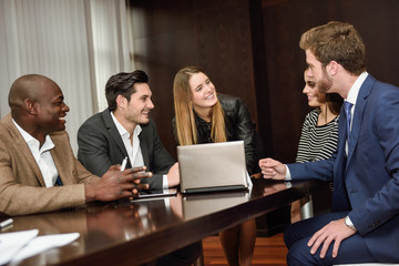 Group of multiethnic busy people working in an office