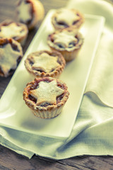 Mince pies with Christmas tree branch
