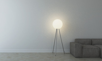 Sofa with lamp in empty room
