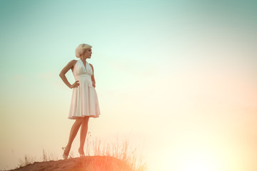 Woman in white dress outdoor