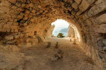 Ancient Monolithos temple ruins with sea view